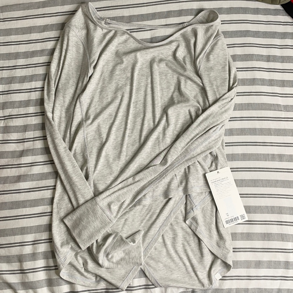 Loved and lifted open back tie sweater